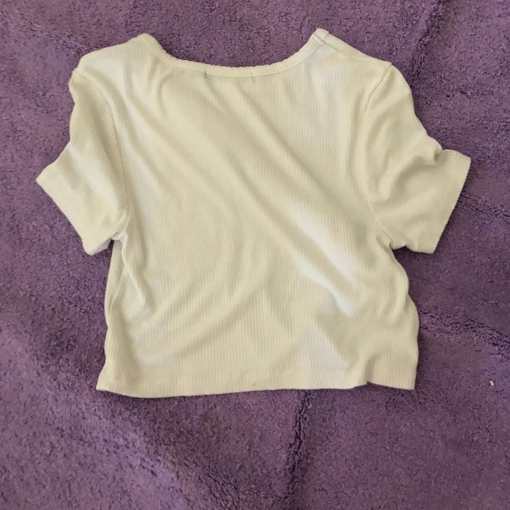 A cropped white shirt sleeve shirt very cozy